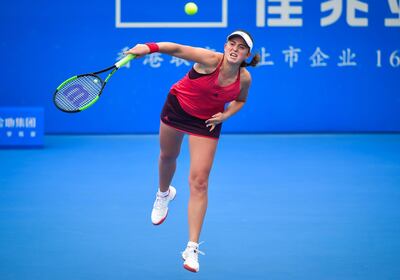 Jelena Ostapenko of Latvia serves against Kristyna Pliskova of Czech Republic during their women's singles second round match at the WTA Shenzhen Open tennis tournament in Shenzhen in China's southern Guangdong province on January 2, 2018. / AFP PHOTO / -