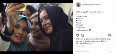 Lindsay Lohan wearing a hijab in 2018. Courtesy Laurelle Kamara / Aidijuma Official Instagram