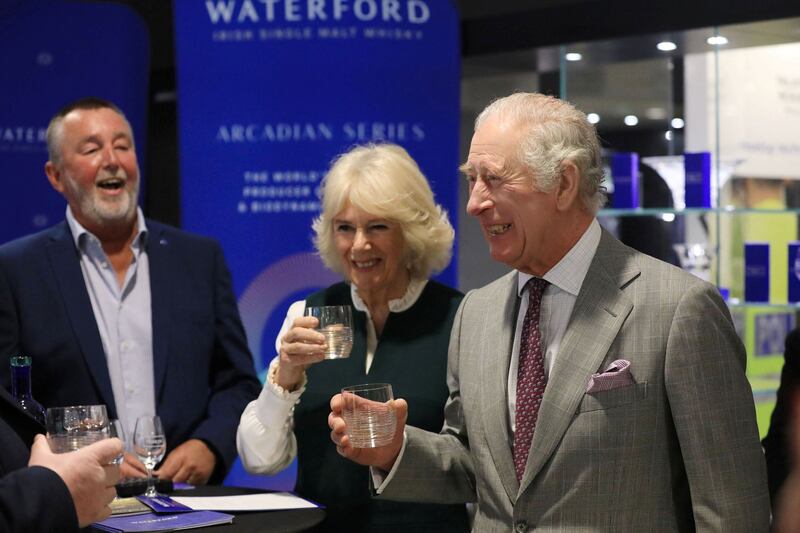 Britain's Prince Charles and Camilla, Duchess of Cornwall, tour the Waterford Crystal factory during their visit to Waterford, Ireland. Reuters