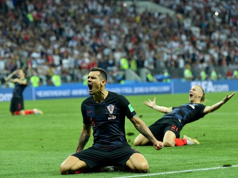 epaselect epa06882008 Dejan Lovren (C) of Croatia celebrates with teammates after winning the FIFA World Cup 2018 semi final soccer match between Croatia and England in Moscow, Russia, 11 July 2018.

(RESTRICTIONS APPLY: Editorial Use Only, not used in association with any commercial entity - Images must not be used in any form of alert service or push service of any kind including via mobile alert services, downloads to mobile devices or MMS messaging - Images must appear as still images and must not emulate match action video footage - No alteration is made to, and no text or image is superimposed over, any published image which: (a) intentionally obscures or removes a sponsor identification image; or (b) adds or overlays the commercial identification of any third party which is not officially associated with the FIFA World Cup)  EPA/PETER POWELL   EDITORIAL USE ONLY