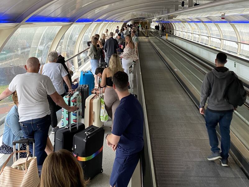 Passengers queue at Manchester Airport, from where Tui has cancelled scores of flights. Photo: Twitter / @chrisjprice67