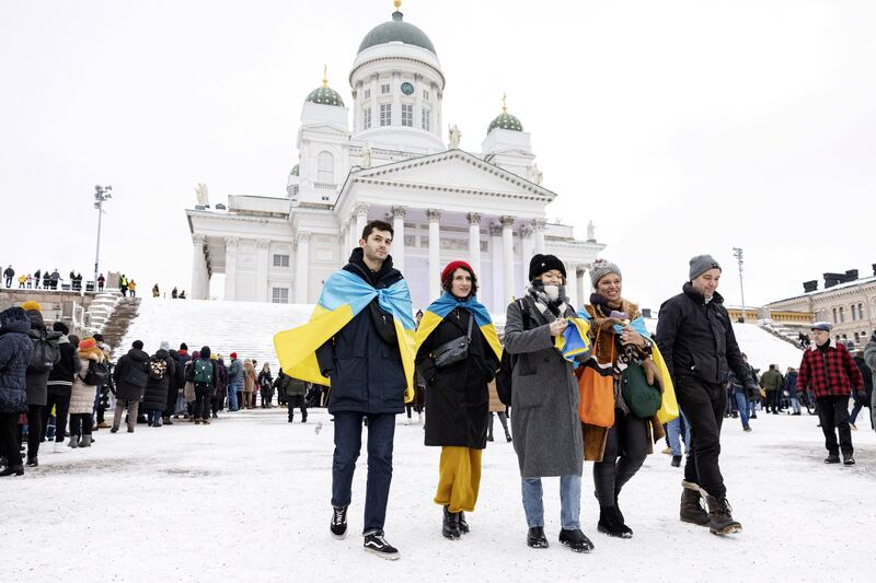 Supporters in front of Helsinki Cathedral during Light for Ukraine candlelight memorial event at Senate Square in Helsinki, Finland. Reuters