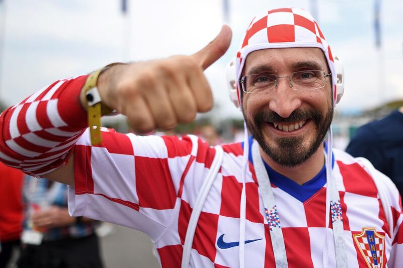 A Croatia's supporter poses at the Luzhniki Stadium in Moscow. AFP