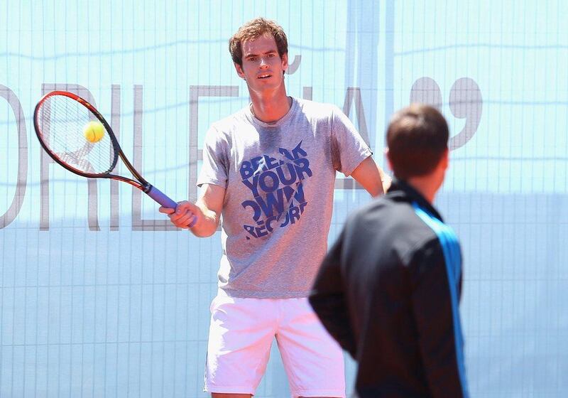 Andy Murray rallies at a practice session ahead of the Madrid Masters at the Caja Magica on Saturday. Julian Finney / Getty Images / May 3, 2014