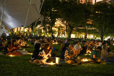 People gather at Speakers Corner in Singapore on April 25 during a vigil for Malaysian national Nagaenthran Dharmalingam, sentenced to death for trafficking heroin into Singapore. AFP