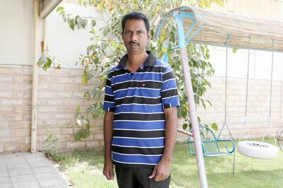 SHARJAH , UNITED ARAB EMIRATES , JULY 14 – 2017 :- Pradeep Kumar from Kerala , India working as a driver for Emirati family at his accommodation in Sharjah. He listens to the radio programme on savings during his break or while driving. ( Pawan Singh / The National ) Story by Ramola Talwar