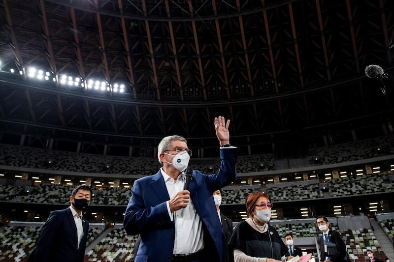 Thomas Bach, IOC president, speaks to the media as he visits the National Stadium. Reuters