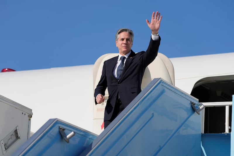 US Secretary of State Antony Blinken waves as he boards his plane at an airport near Tel Aviv, Israel on Thursday. Reuters