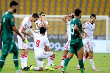 UAE players are devastated after the one all draw in the UAE's world cup qualifying match against Iraq. Zabeel Stadium, Dubai. Chris Whiteoak / The National