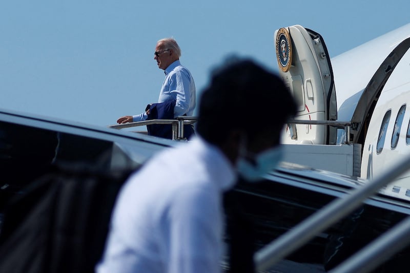 US President Joe Biden and his travelling party board Air Force One to return to Washington from Rhode Island on July 20. Reuters
