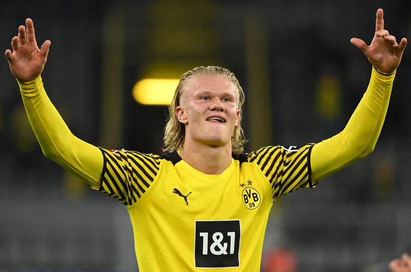 Dortmund's Norwegian forward Erling Haaland celebrates the win against Hoffenheim. AFP