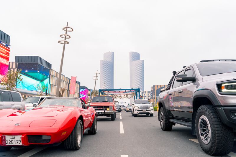 Cars drive down the Lusail Boulevard 