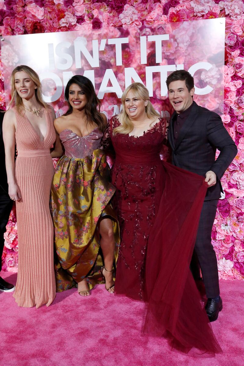 Cast members Betty Gilpin, Priyanka Chopra, Rebel Wilson and Adam Devine. Reuters