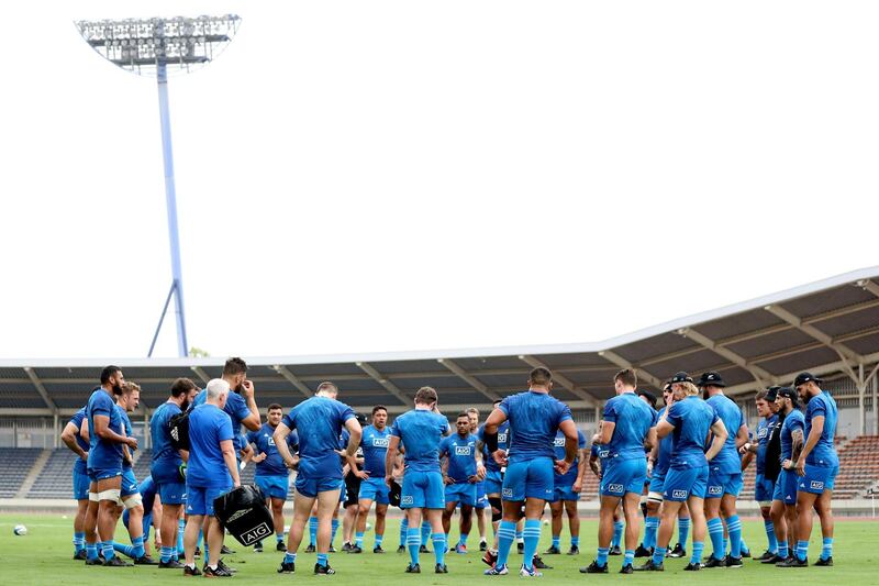 The All Blacks gather for a team talk during training at Kashiwanoha Stadium.Getty