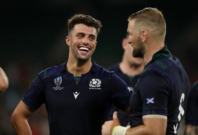 FUKUROI, JAPAN - OCTOBER 09: Adam Hastings of Scotland celebrates after the match with John Barclay of Scotland  the Rugby World Cup 2019 Group A game between Scotland and Russia at Shizuoka Stadium Ecopa on October 09, 2019 in Fukuroi, Shizuoka, Japan. (Photo by Mike Hewitt/Getty Images)
