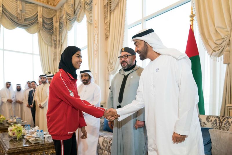 ABU DHABI, UNITED ARAB EMIRATES - September 10, 2018: HH Sheikh Mohamed bin Zayed Al Nahyan, Crown Prince of Abu Dhabi and Deputy Supreme Commander of the UAE Armed Forces (R), receives 18th Asian Games Jiu Jitsu winners, during a Sea Palace barza. Seen with HM King Mohamed VI of Morocco (2nd R).

( Mohamed Al Hammadi / Crown Prince Court - Abu Dhabi )
---