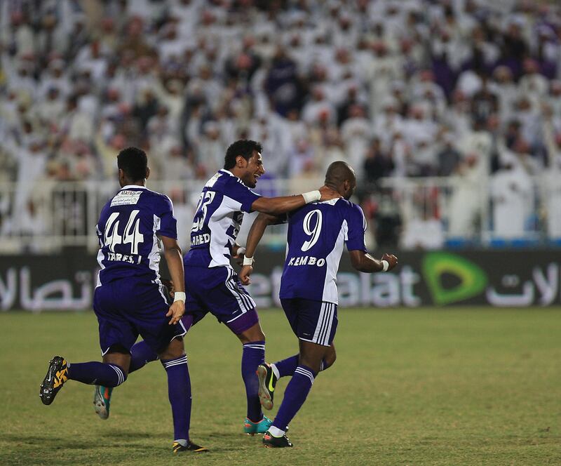 ABU DHABI - UNITED ARAB EMIRATES - 05DEC2012 - Al Ain’s Jires Kembo-Ekoko (R) celebrate after scoring the first goal against Baniyas during the Etisalt pro-league match in Baniyas Studium. Ravindranath K / The National