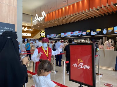 The queue at Al Baik in The Dubai Mall. Suhail Rather / The National