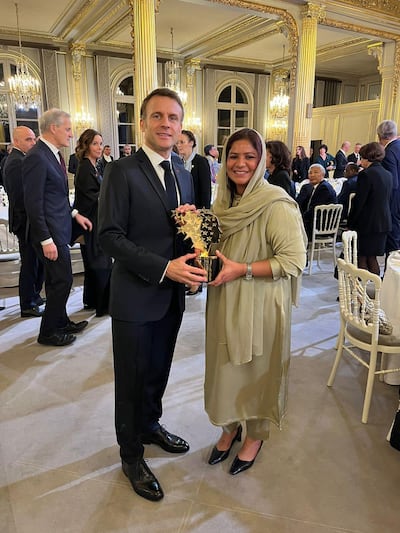 French President Emmanuel Macron congratulates Sister Zeph, winner of the Global Teacher Prize 2023 at the Elysee. Photo: Global Teacher Prize