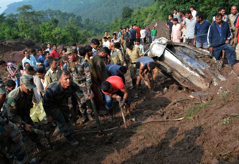"Around 200 metres of national highway washed away with two buses and more than 50 feared buried," said Indian army spokesman Colonel Aman Anand. Reuters