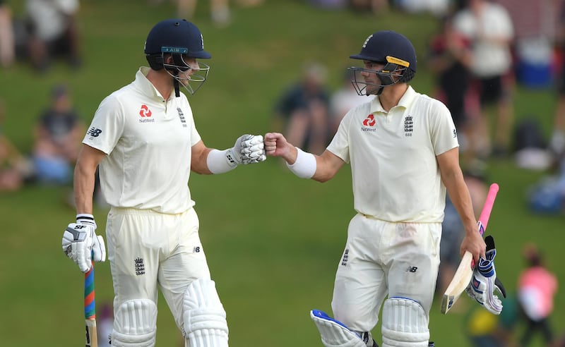 CENTURION, SOUTH AFRICA - DECEMBER 28: England batsmen Joe Denly (l) and Rory Burns touch gloves as play finishes for the day with both batsmen still at the crease after Day Three of the First Test match between England and South Africa at SuperSport Park on December 28, 2019 in Pretoria, South Africa. (Photo by Stu Forster/Getty Images)
