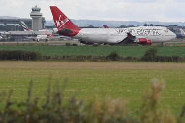 A Virgin Atlantic passenger aircraft prepares for take off from Gatwick Airport. The carrier is relocating to London Heathrow as part of a series of cost-cutting measures as it looks to preserve cash in the wake of the Covid-19 outbreak. Reuters  