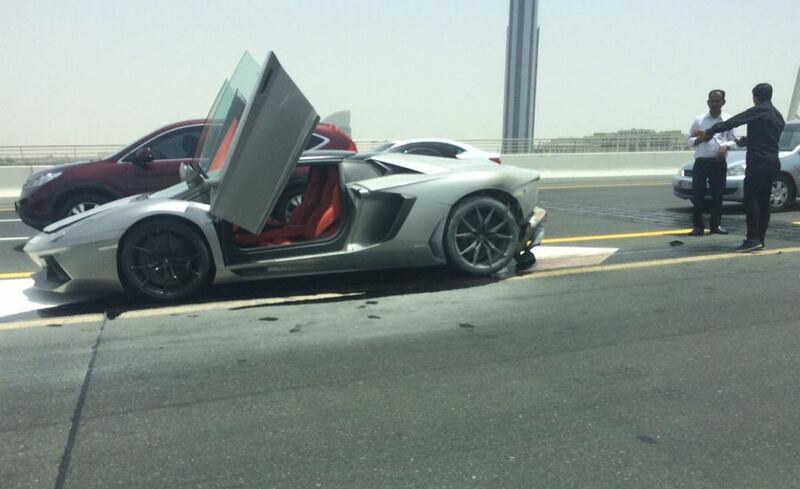A silver-coloured Lamborghini caught fire in Al Garhoud on Sunday afternoon. The National