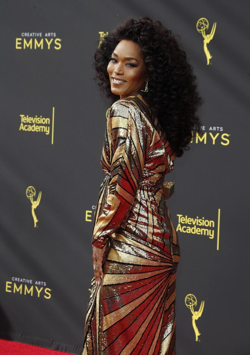 epa07843681 Angela Bassett arrives on the red carpet for the 2019 Creative Arts Emmy Awards at the Microsoft Theater in Los Angeles, California, USA, 14 September 2019. The Creative Arts Emmy Awards honor excellence in Television technical categories such as makeup, casting direction, costume design, editing and cinematography. The 71st Primetime Emmy Awards Ceremony will take place on 22 September 2019.  EPA/NINA PROMMER