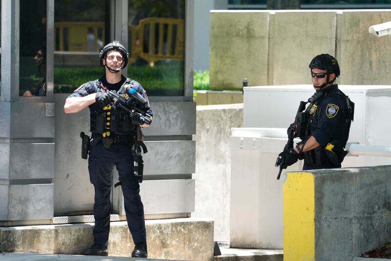 Federal Protective Service officers guard the courthouse. AP