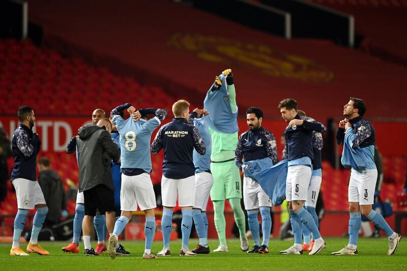Manchester City players  walk out in tribute No 8 shirts in honour of Colin Bell. Getty