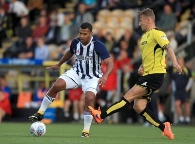 West Bromwich Albion's Salomon Rondon (left) and Burton Albion's Kyle McFadzean battle for the ball during a pre-season friendly match at the Pirelli Stadium, Burton-on-Trent. PRESS ASSOCIATION Photo. Picture date: Wednesday July 26, 2017. See PA story SOCCER Burton. Photo credit should read: Tim Goode/PA Wire. RESTRICTIONS: EDITORIAL USE ONLY No use with unauthorised audio, video, data, fixture lists, club/league logos or "live" services. Online in-match use limited to 75 images, no video emulation. No use in betting, games or single club/league/player publications.