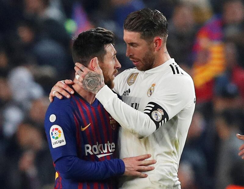 Barcelona's Lionel Messi, left, and Real Madrid's Sergio Ramos after the match. Reuters