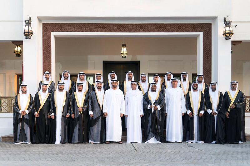 ABU DHABI, UNITED ARAB EMIRATES - November 15, 2018: HH Sheikh Mohamed bin Zayed Al Nahyan, Crown Prince of Abu Dhabi and Deputy Supreme Commander of the UAE Armed Forces (6th L), HE Ahmed Juma Al Zaabi, UAE Deputy Minister of Presidential Affairs (7th L) and HE Jaber Al Suwaidi, General Director of the Crown Prince Court - Abu Dhabi (9th L), stand for a photograph during a mass wedding held at Majlis Al Manhal. 

( Rashed Al Mansoori / Ministry of Presidential Affairs )
---
