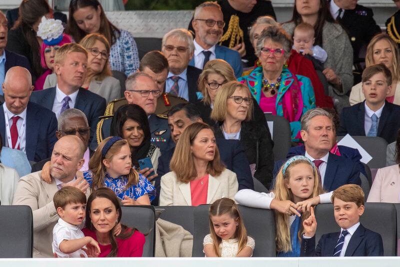 Prince Louis, Princess Charlotte and Prince George watch the platinum pageant with their mother in London.