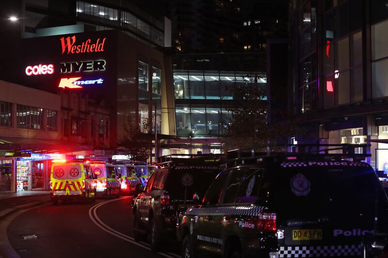 NSW police and ambulance vehicles line the streets outside Westfield Bondi Junction. Getty Images