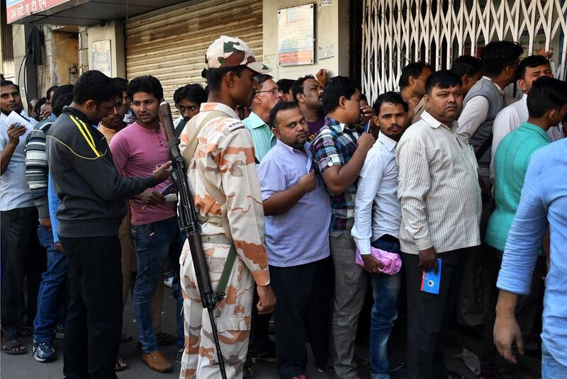 ATMs were drained of cash and huge queues formed at banks across the country as Indians deposited their old notes. Anindito Mukherjee / Bloomberg