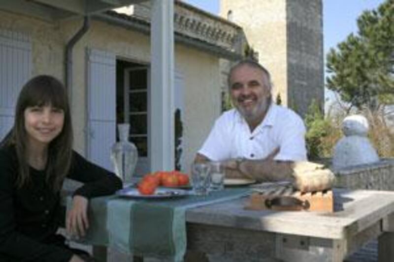 Xavier Dupuy with his daughter, Zoè, at his house in Gascony in the south-west of France. It is Dupuy's favourite home, where the family goes on holiday.