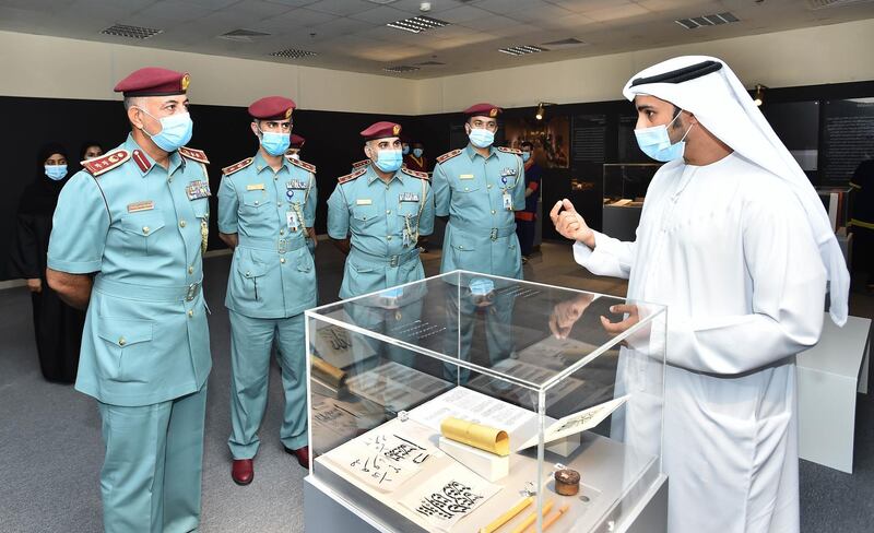 Nasir Al Darmaki, strategic planning department manager of Sharjah Museums Authority, with police officers. All photos by Sharjah Museums Authority