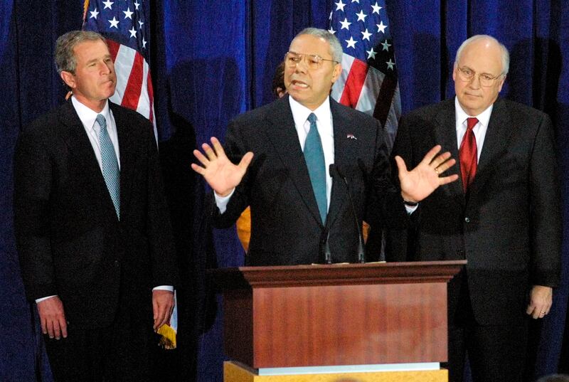 Powell with George W. Bush (L) and Dick Cheney in Crawford, Texas, December 2000. Reuters