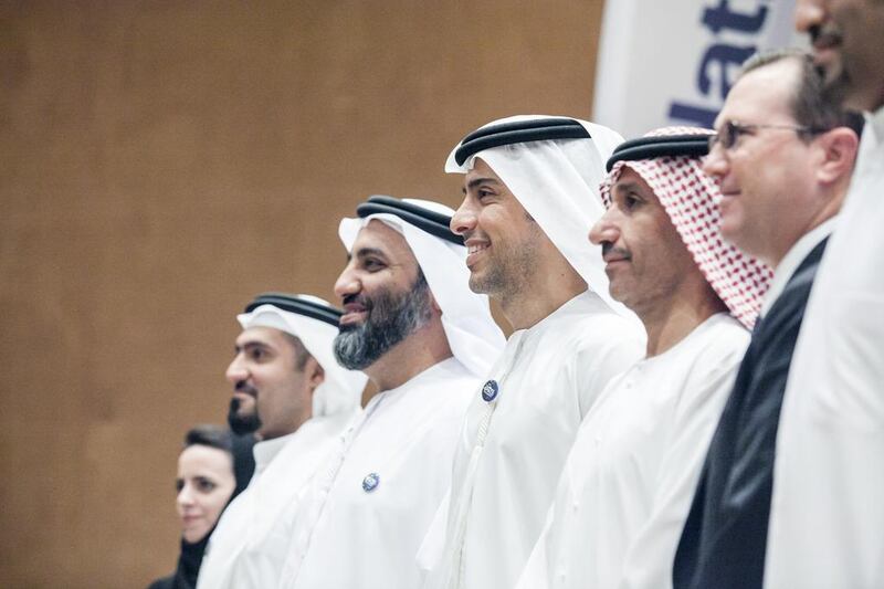 Mohammed Al Otaiba, Editor-in-Chief of The National, with Dr Mohammed Al Ahbabi, Director General of the UAE Space Agency, second right, and Peter McGrath, Director, Global Sales and Marketing, Space Exploration, Boeing, right, at the press conference. Silvia Razgova for The National