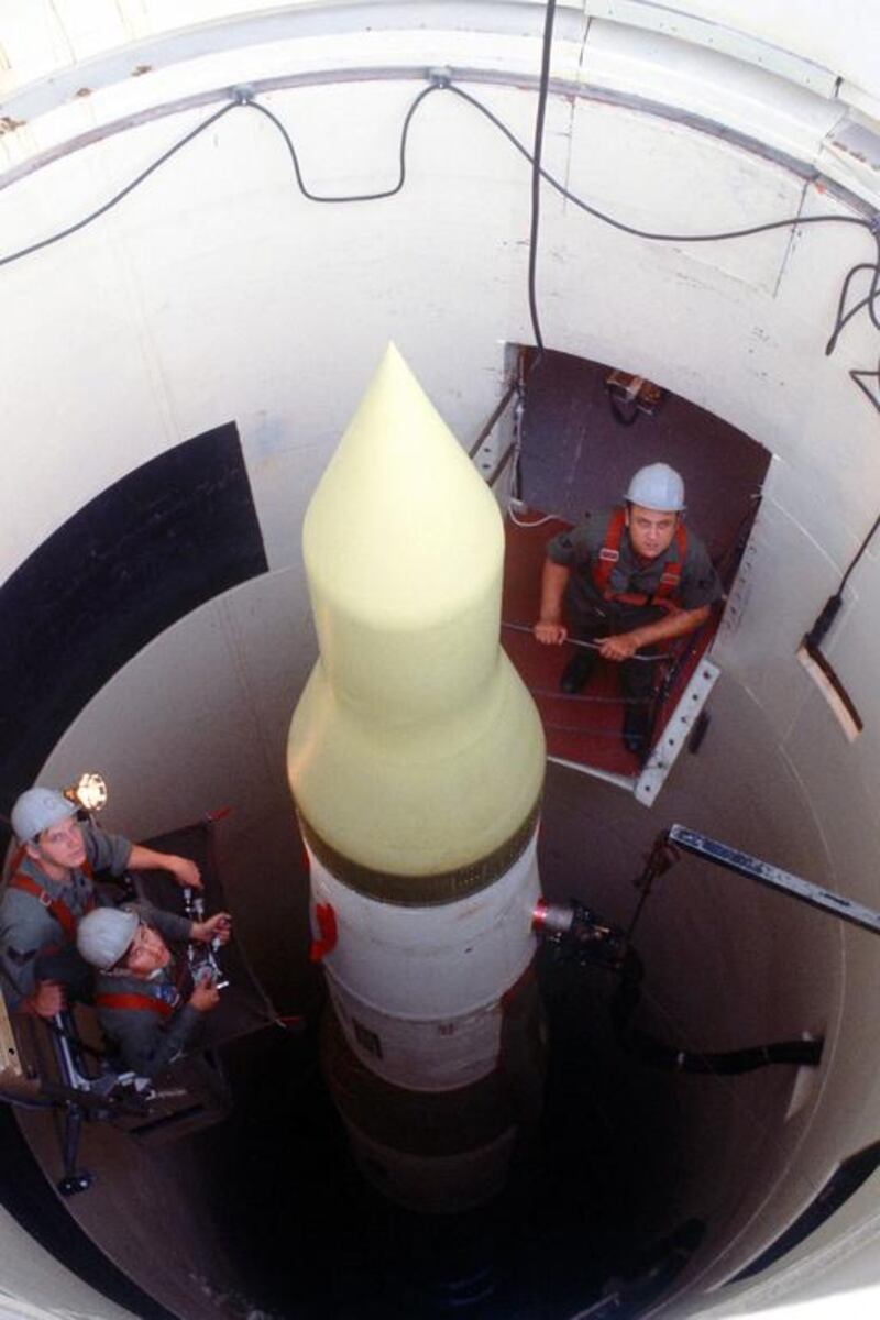 US air force technicians check on an LGM-30F Minuteman III in its silo in Missouri, Courtesy : USAF