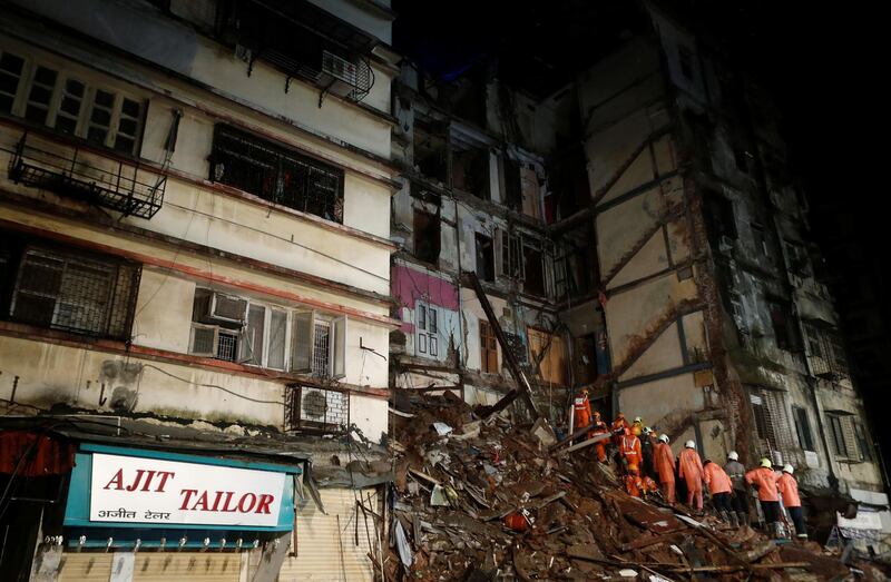 Witness said there were five or six families living the building when it collapsed. Reuters