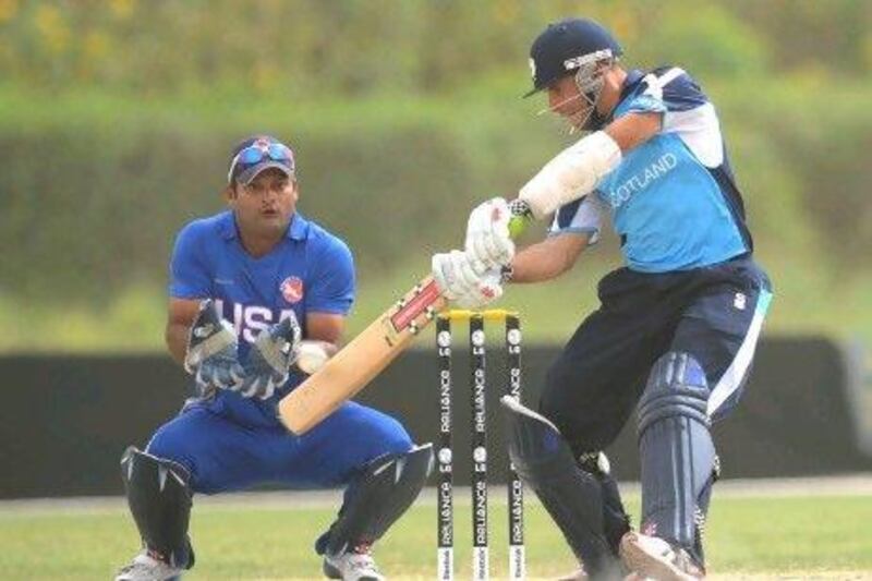 Scotland lost to the United States in their final match of pool play but still edged Kenya to move on to the next round of the World Twenty20 Qualifier tournament, being held in the United Arab Emirates.