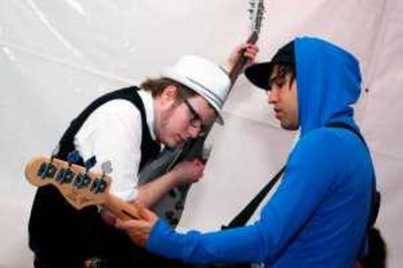 Mandatory Credit: Photo by Sara Jaye / Rex Features ( 783147ab )

Patrick Stump and Pete Wentz of Fall Out Boy tuning up before the show

Victoria's Secret presents 'Pinkapalooza' on the Santa Monica Pier, Santa Monica, America - 17 Jul 2008



