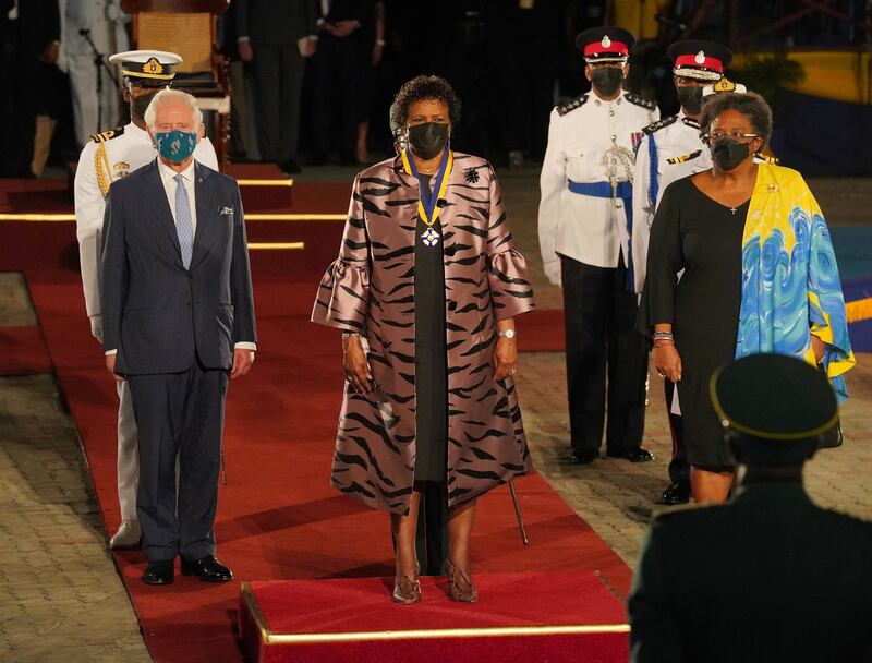 Prince Charles is joined by the president and prime minister on stage. Reuters