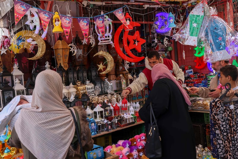 Shopping for decorations in Al-Zawya old market in Gaza city, in preparation for Ramadan. AFP