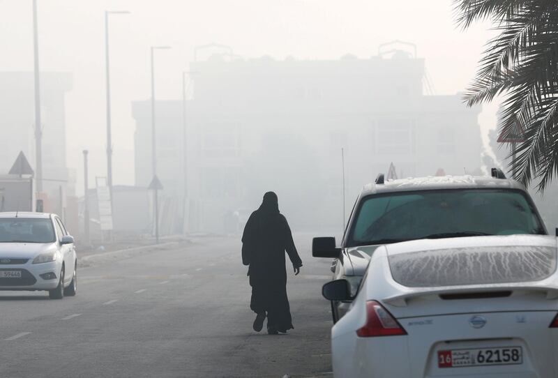 Khalifa City, Abu Dhabi, March 6, 2018.  A lady takes her morning walk amidst the fog at the Khalifa City A neighborhood.
Victor Besa / The National