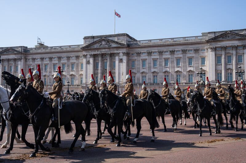 Members of the Household Cavalry take part in a rehearsal for the coronation at Buckingham Palace. Getty Images