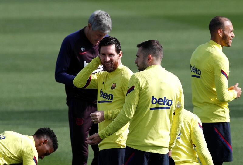 Barcelona's Lionel Messi and teammates