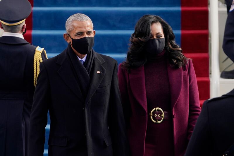 Former President Barack Obama and his wife Michelle arrive for the 59th Presidential Inauguration at the US Capitol for President-elect Joe Biden. AP Photo